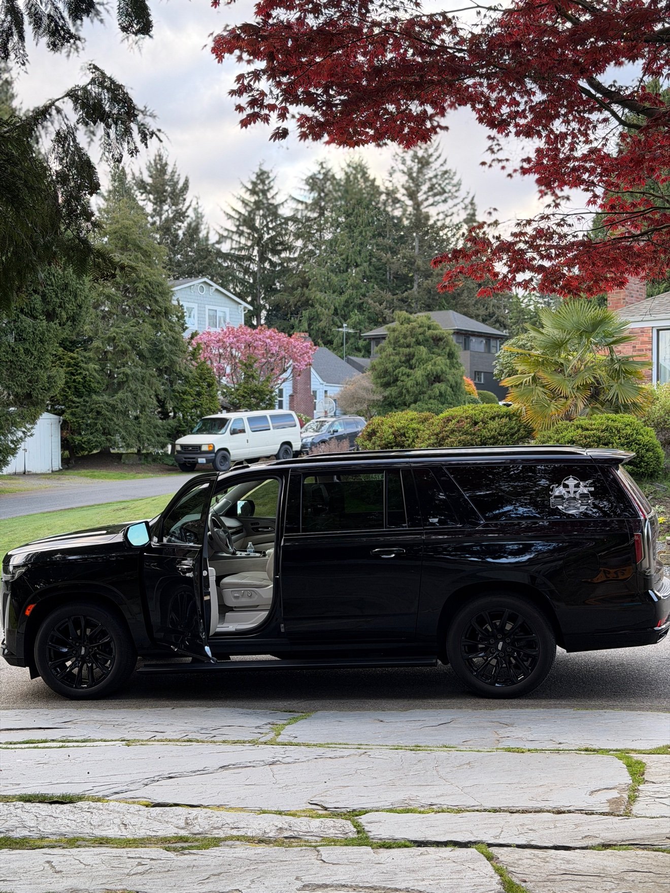 Black Cadillac Escalade for family airport transfers in Seattle